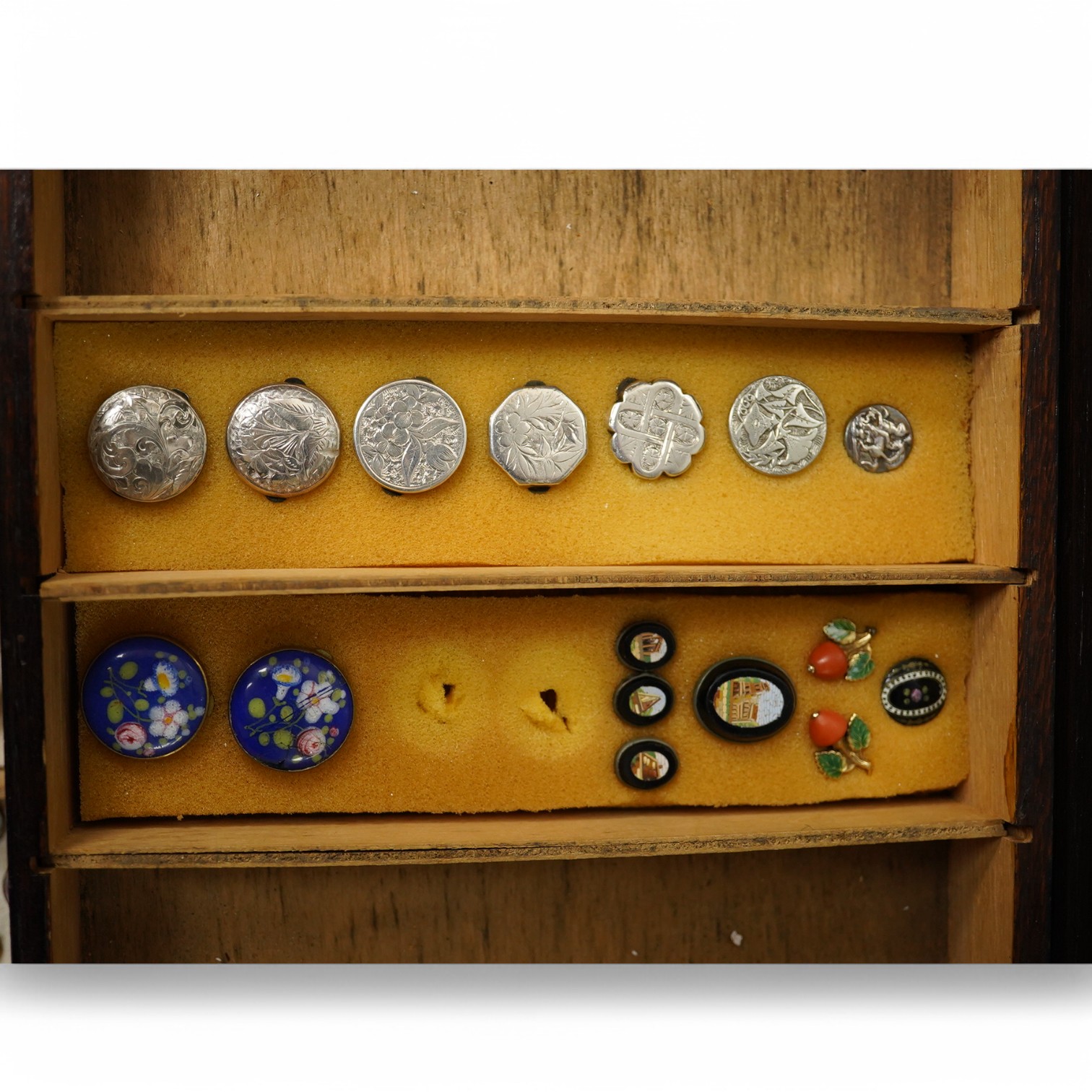 Sixteen assorted late 19th/early 20th century buttons and studs, largest 23mm;, Condition- good